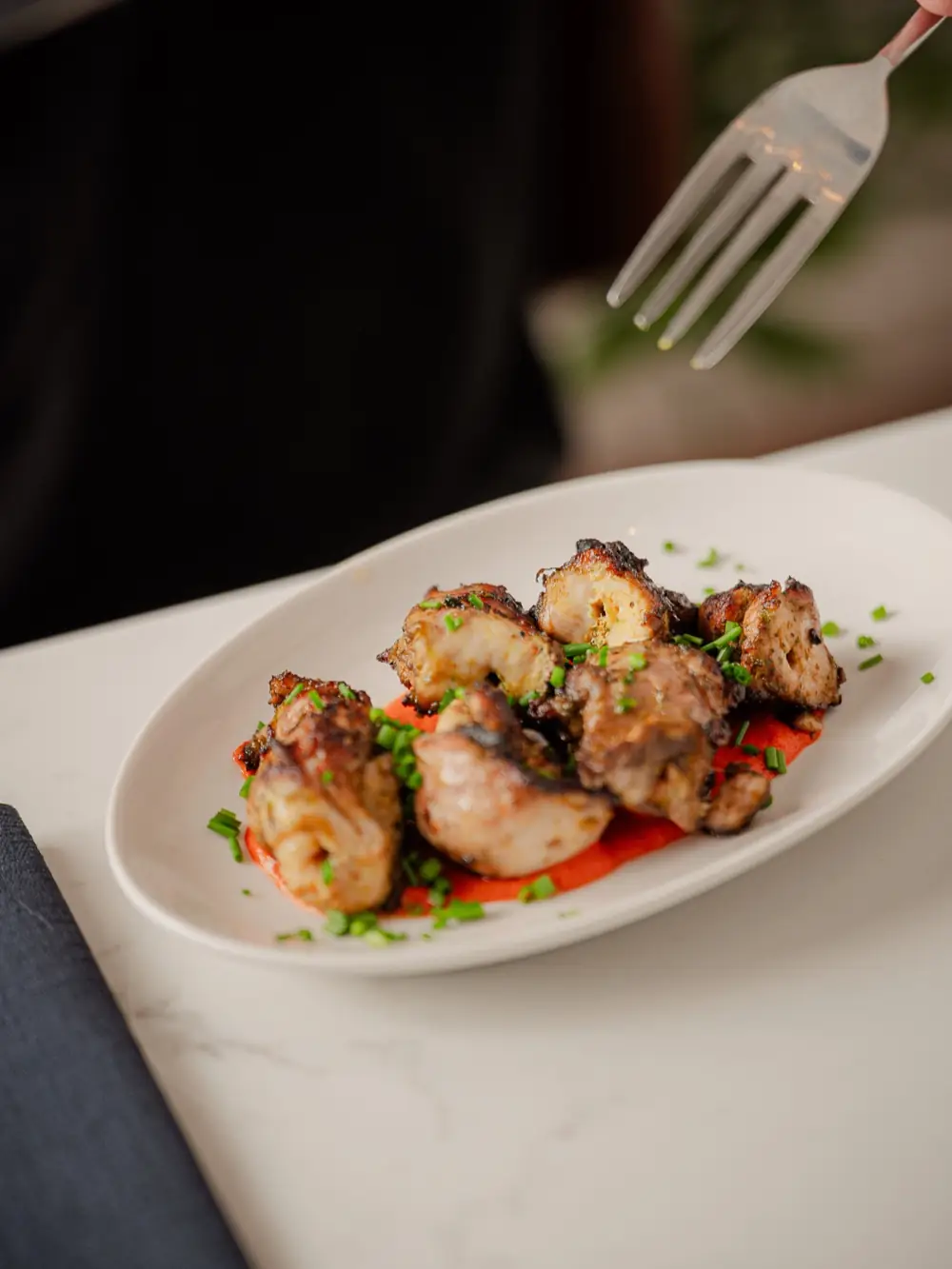 Chargrilled chicken thighs with romesco sauce
