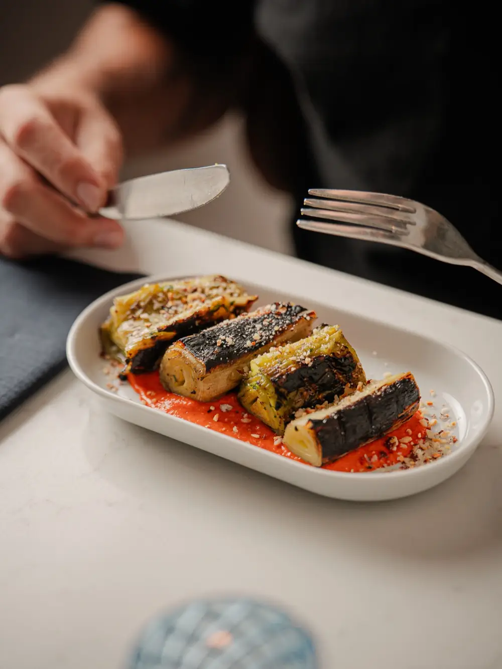 Chargrilled leeks with romesco