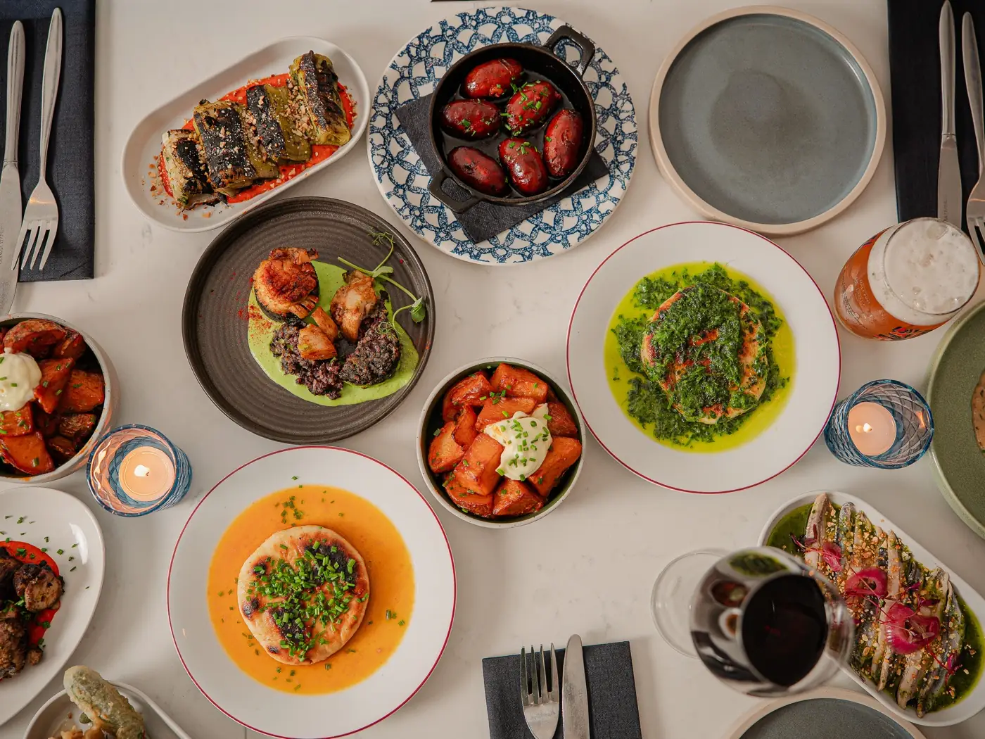 A full table of tapas photographed from above