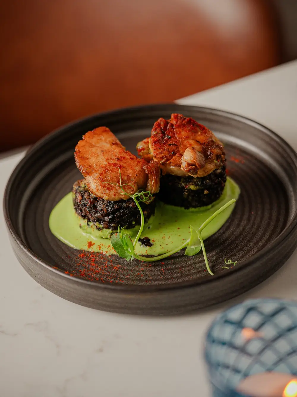 Scallops on Burgos black pudding with pea purée